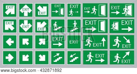 A Lot Of Exit Signs With White Arrows On Green Background. Evacuation Concept. Vector Illustration. 