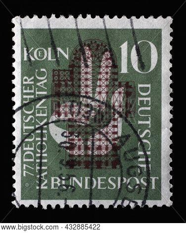 ZAGREB, CROATIA - JUNE 25, 2014: Stamp printed in Germany, shows a hand raised to the oath in front of the floor plan of the Cologne Cathedral, 77th German Catholic Day in Cologne, circa 1956