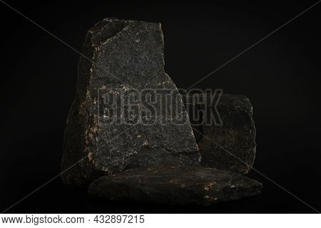 Rock Podium On The Black Background. Stone Podest For Product, Cosmetic Presentation. Creative Mock 