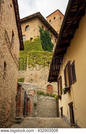 Narrow Street With Castle View Of Serralunga D'alba, Piemonte, Langhe Wine District And Unesco Herit