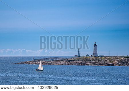 Lighthouses And Sailboat On An Archipelago Island In Norway.