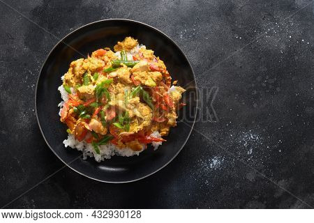 Traditional Thai Breakfast Gai Pad Pongali With Chicken, Eggs, Yellow Thai Curry Paste On Rice.