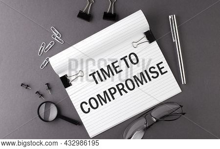 Notebook With Tools And Notes With Text Time To Compromise , Business Concept