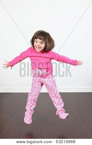 Adorable little girls posing for photos in PJ's