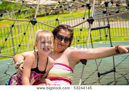 Happy  Six Year Old Child With Her Mother