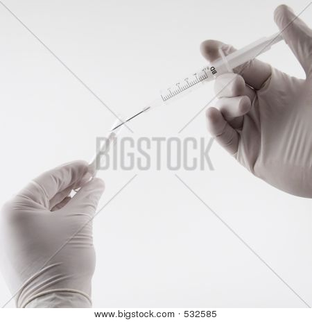 Medical Worker Running Blood Samples