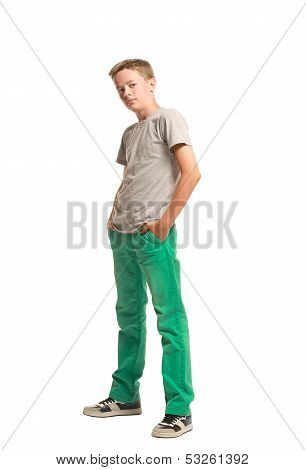 Teenager Standing With Hands In Pockets