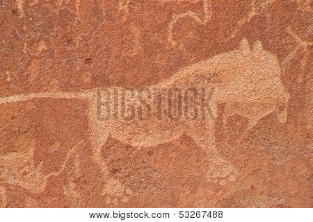 Rock engraving of an African lion, Twyfelfontein archaeological site, Namibia	
