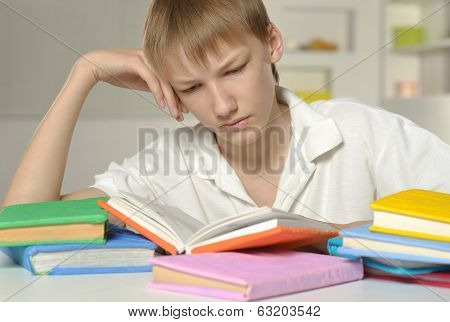 Boy is doing homework