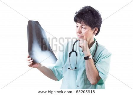 Doctor Analysing A Skiagraph