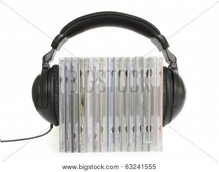 headphones on the cds isolated on white