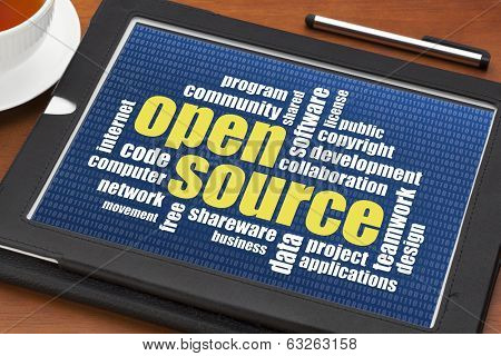 computer software development concept - open source word cloud on a digital tablet