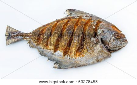 Asian Style Deep Fried Pomfret In White Isolated Background