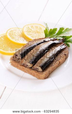 Sprats Sandwich And Lemon Slices