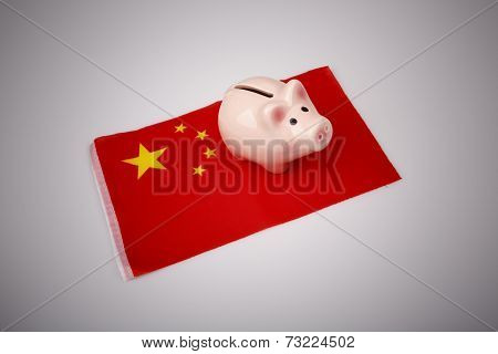 Pig Money Box And China Flag