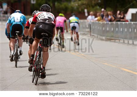 Cyclists Sprint Down Street In Duluth Criterium Event