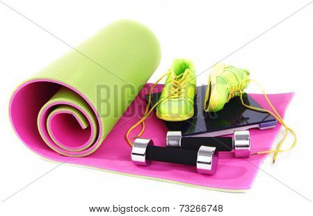 Sport requisites on a carpet isolated on white