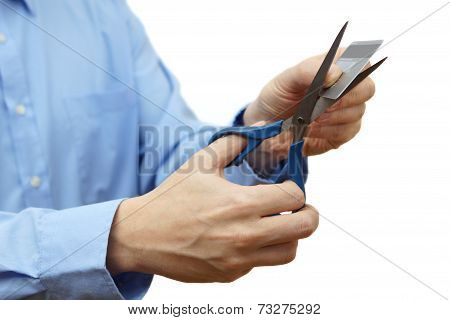 Reduce Your Credit Card Debt Concept With Scissors And Credit Card