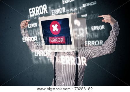Business man with pc monitor on his head and error messages darker background