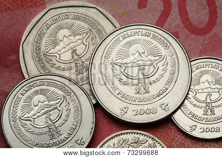 Coins of Kyrgyzstan. National emblem of Kyrgyzstan depicted in Kyrgyzstani som coins. 