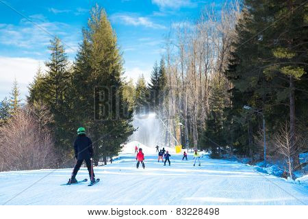Skiers on the slope in Bansko, Bulgaria