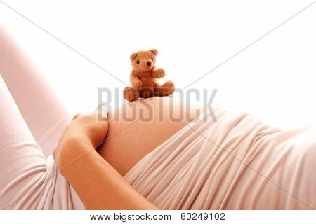 Pregnant Woman On A White Background
