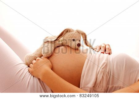 Pregnant Woman On A White Background