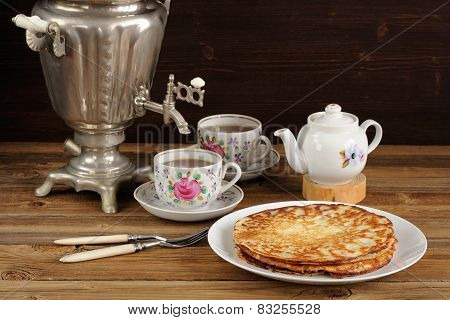Russian Bliny With Vintage Samovar And Teaware
