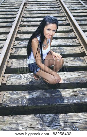 A fashion woman on the railroad train.