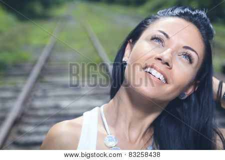 A fashion woman on the railroad train.