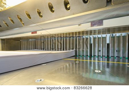 modern paper guillotine with touch screen used in commercial printing industry
