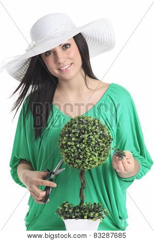 Gorgeous woman wearing a white garden hat.