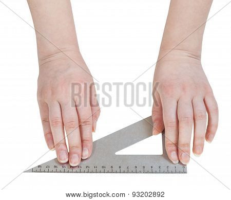 Female Hands With Metallic Triangle Isolated