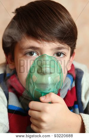 Preteen Boy With Electric Inhaler