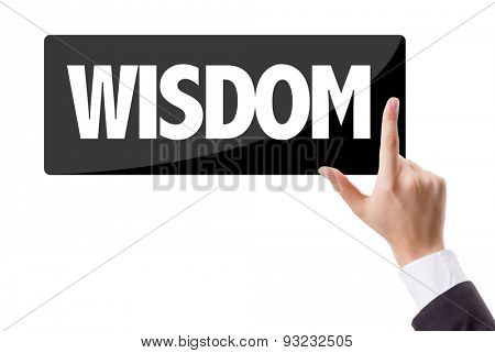 Businessman pressing button with the text: Wisdom