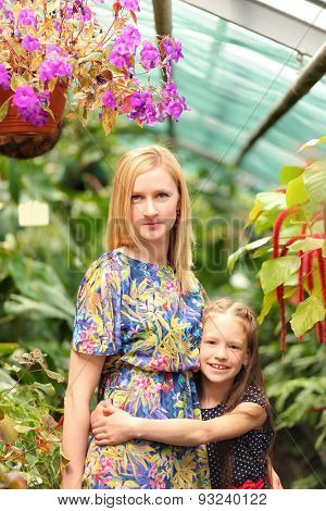 young mother with daughter in park