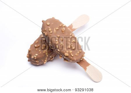 a cold ice cream and chocolate cream with pieces of hazelnut