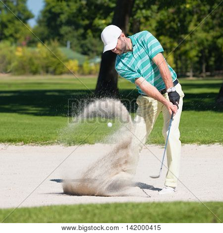 Golfer In Sand Trap