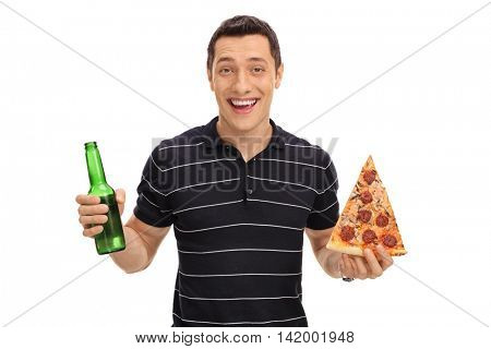 Smiling young guy holding a beer bottle in one hand and a slice of pizza in the other isolated on white background
