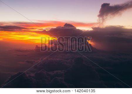 Photo of the Impressive clouds at sunrise over Maldives islands. Soft focus