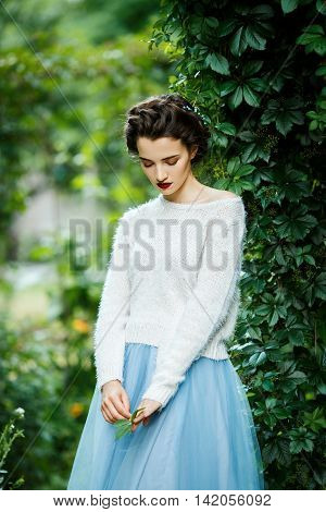 Young Vintage Style Woman Posing In A Vineyard