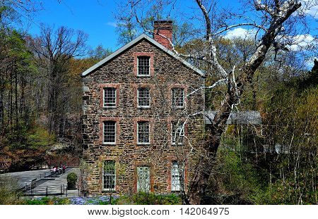 Bronx New York - April 29 2015: The 1840 Old Stone Mill at the New York Botanical Garden *