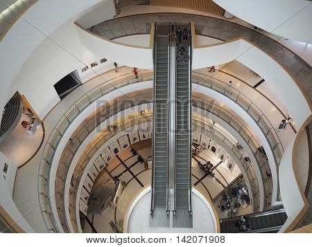 BANGKOK THAILAND - AUGUST 7 2016: Walkway escalator hall in Bangkok Art and Culture Centre. It is famous exhibition and contemporary arts in Bangkok.