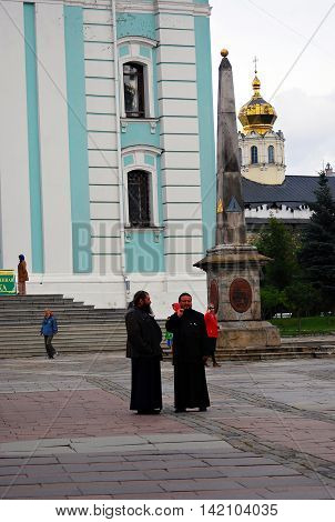 SERGIEV POSAD, RUSSIA - SEPTEMBER 06, 2012: Priests in Trinity Sergius Lavra Sergiev Posad Russia. UNESCO World Heritage Site.
