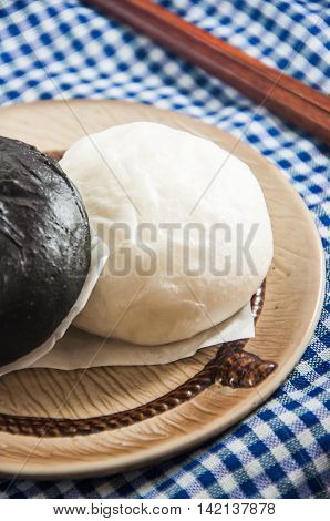 Chinese steamed bun and sweet creamy stuff