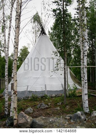Traditional hut to smoke fish on the river at Kola Peninsula Russia.