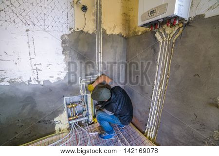 pipefitter installing system of heating