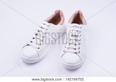 Women's sport leather shoes on white background