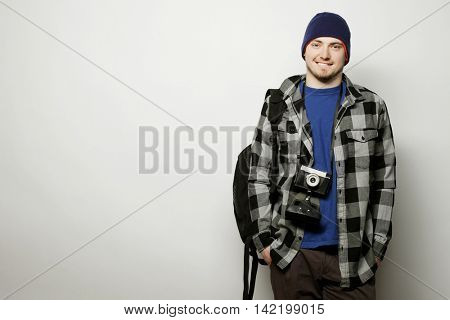 technology, people and life style concept: young  photographer over white background