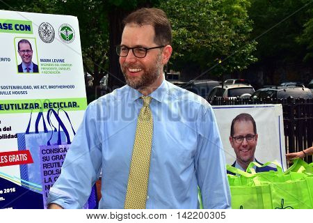 New York City - May 27 2016: District 7 NYC Council Member Mark Levine at an environmental free reuseable shopping bag giveaway in Hamilton Heights
